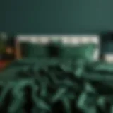 Luxurious dark green sheets elegantly draped over a queen-sized bed