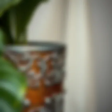 Close-up of the intricate design on a metal plant container