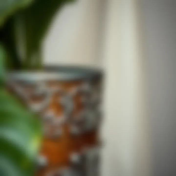 Close-up of the intricate design on a metal plant container