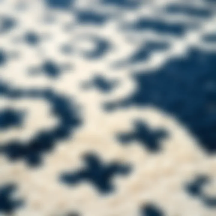 Intricate Patterns in Navy and Cream Area Rug Textured close-up of a navy and cream area rug showcasing its intricate patterns