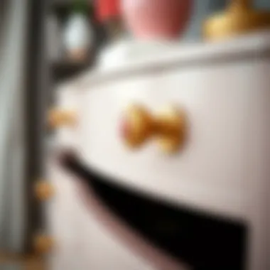 Elegant pink and gold drawer knobs showcased on a stylish dresser