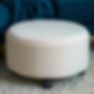 Close-up of round ottoman showcasing unique material and design
