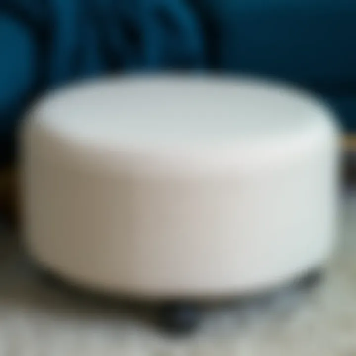 Close-up of round ottoman showcasing unique material and design