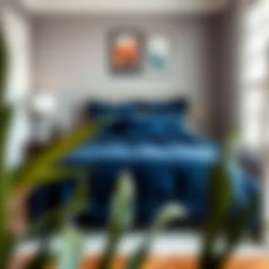 Stylish Bedroom with Navy Blue Quilt Stylish bedroom featuring navy blue quilt coordinating with wall decor