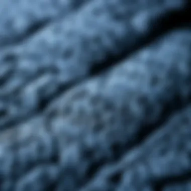 Intricate Patterns of Navy Blue Quilt Close-up of navy blue fabric with intricate patterns