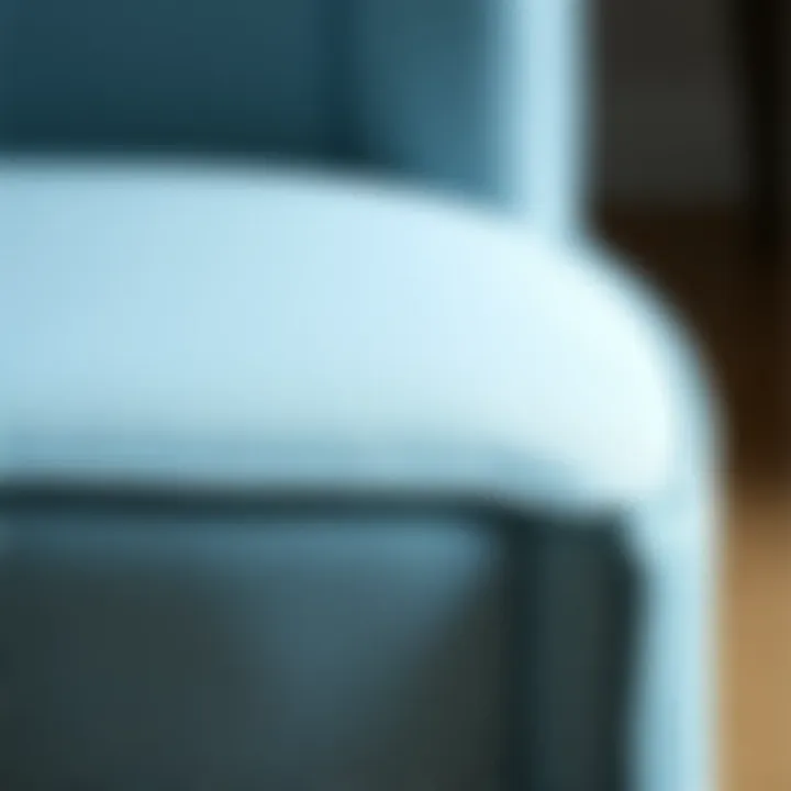 Craftsmanship on Display: Texture of the Pale Blue Chair Close-up of a pale blue chair showcasing its texture and craftsmanship